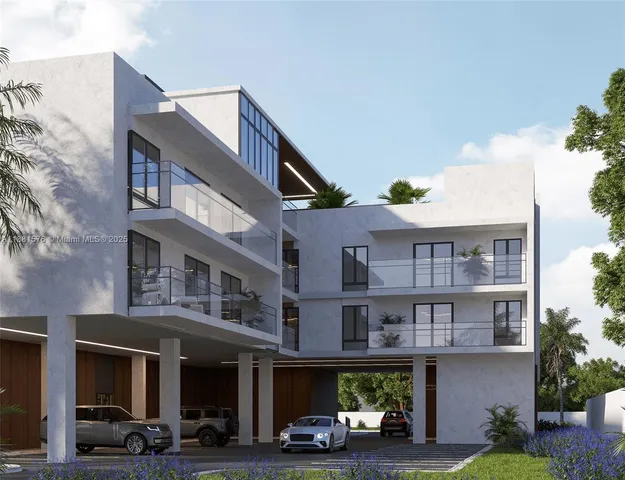 a front view of building with cars parked