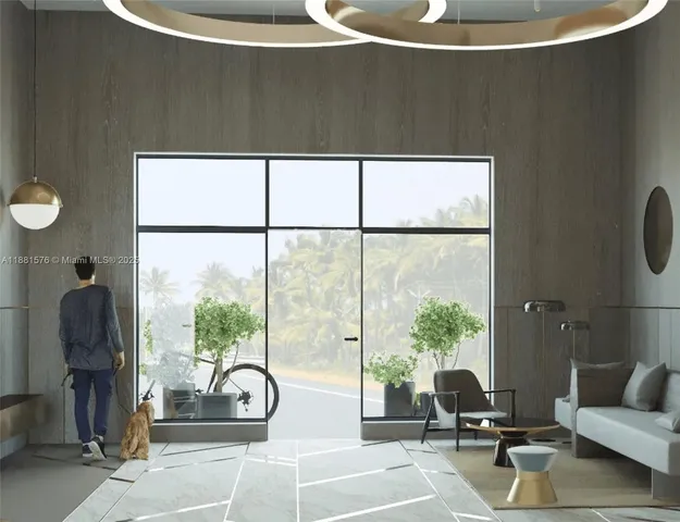 a living room with a large window and a table