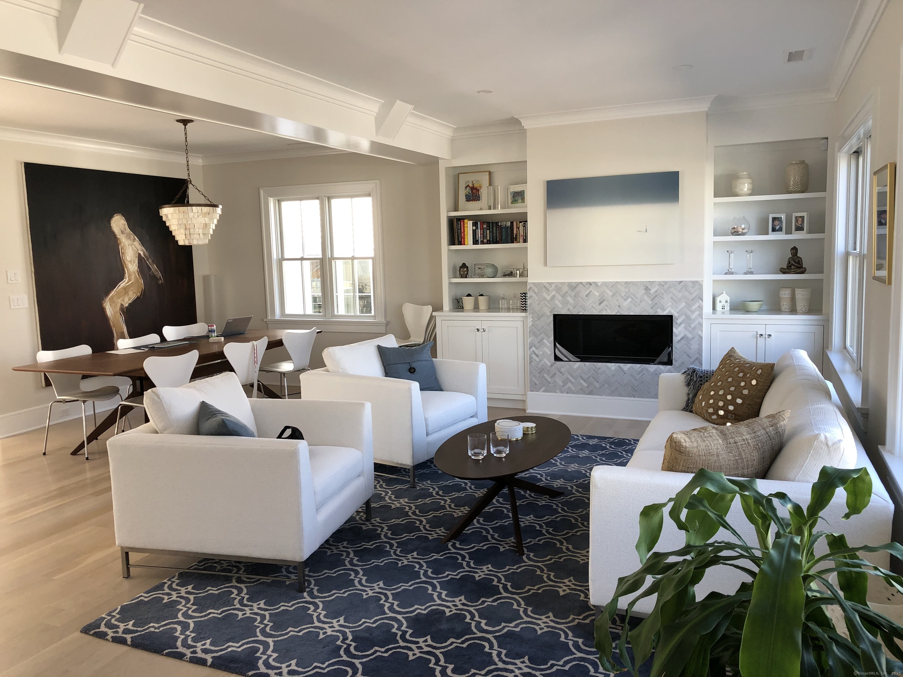 20 Locust Hill Road Darien, CT 06820 - Photo 4 of 12 a living room with furniture fireplace and a large window