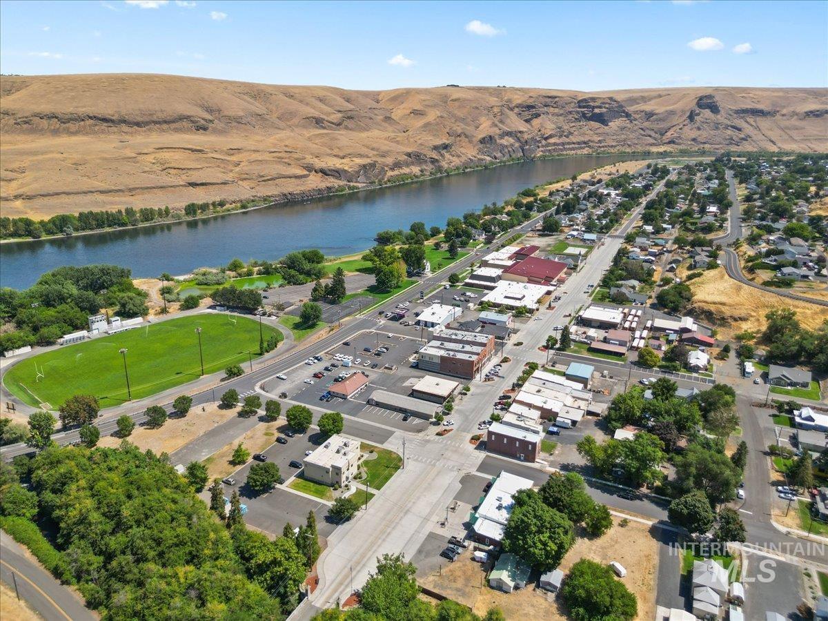 90 2nd Street Asotin, WA 99402 - Photo 4 of 25 Aerial overview of property's location with a water and mountain view and nearby suburban area