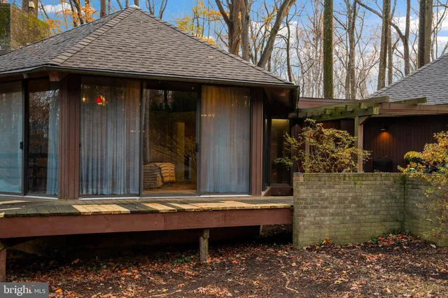 a view of house with outdoor seating