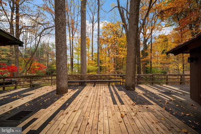 a view of outdoor space with lots of furniture and wooden floor