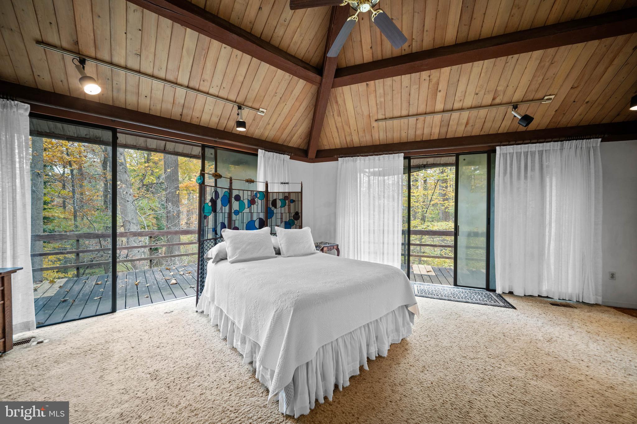 2707 Caves Road Owings Mills, MD 21117 - Photo 23 of 30 a bedroom with a bed and large window