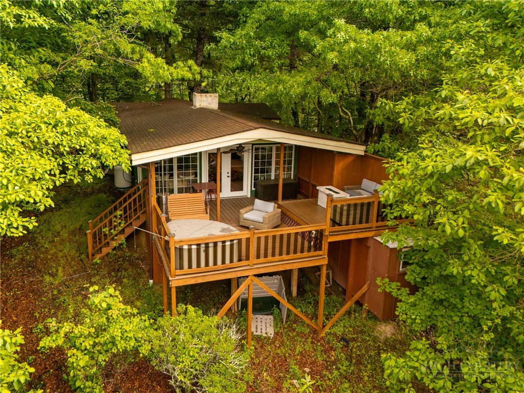 280 Chinkapin Ridge Road Seven Devils, NC 28604 - Photo 2 of 40 a view of a house with a yard and furniture