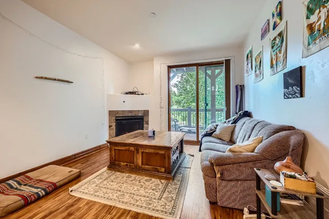 a living room with a couch and a table