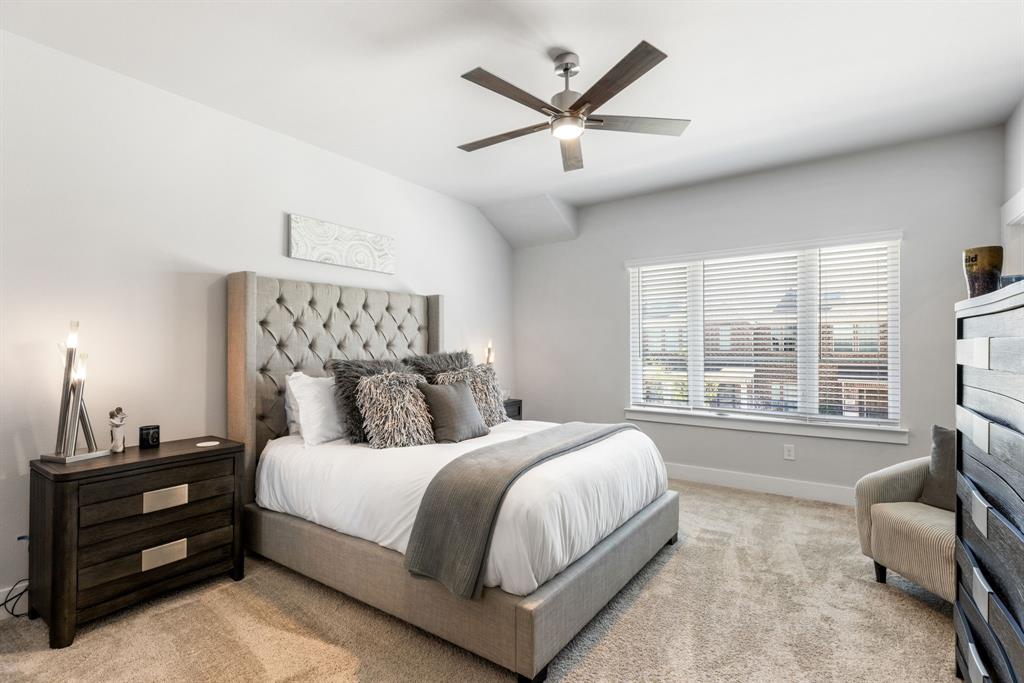 4502 Smokey Quartz Lane Arlington, TX 76005 - Photo 18 of 32 a bedroom with a large bed and a window