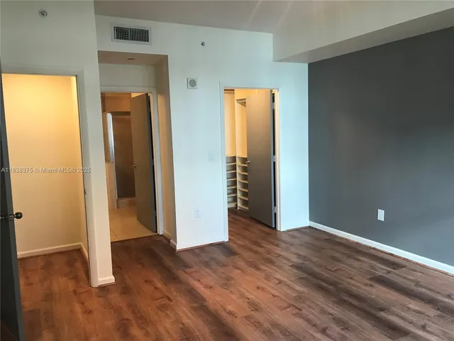 a bathroom with a bathtub and a sink