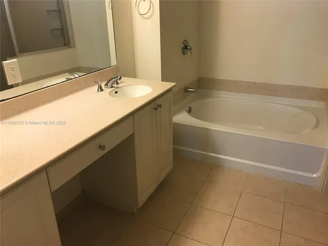 a bathroom with a shower and a toilet