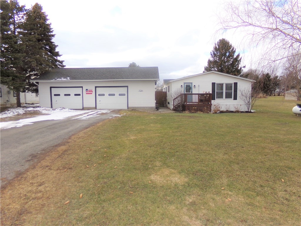 7016 Macomber Road Oakfield, NY 14125 - Photo 1 of 1 Front of house with open front porch