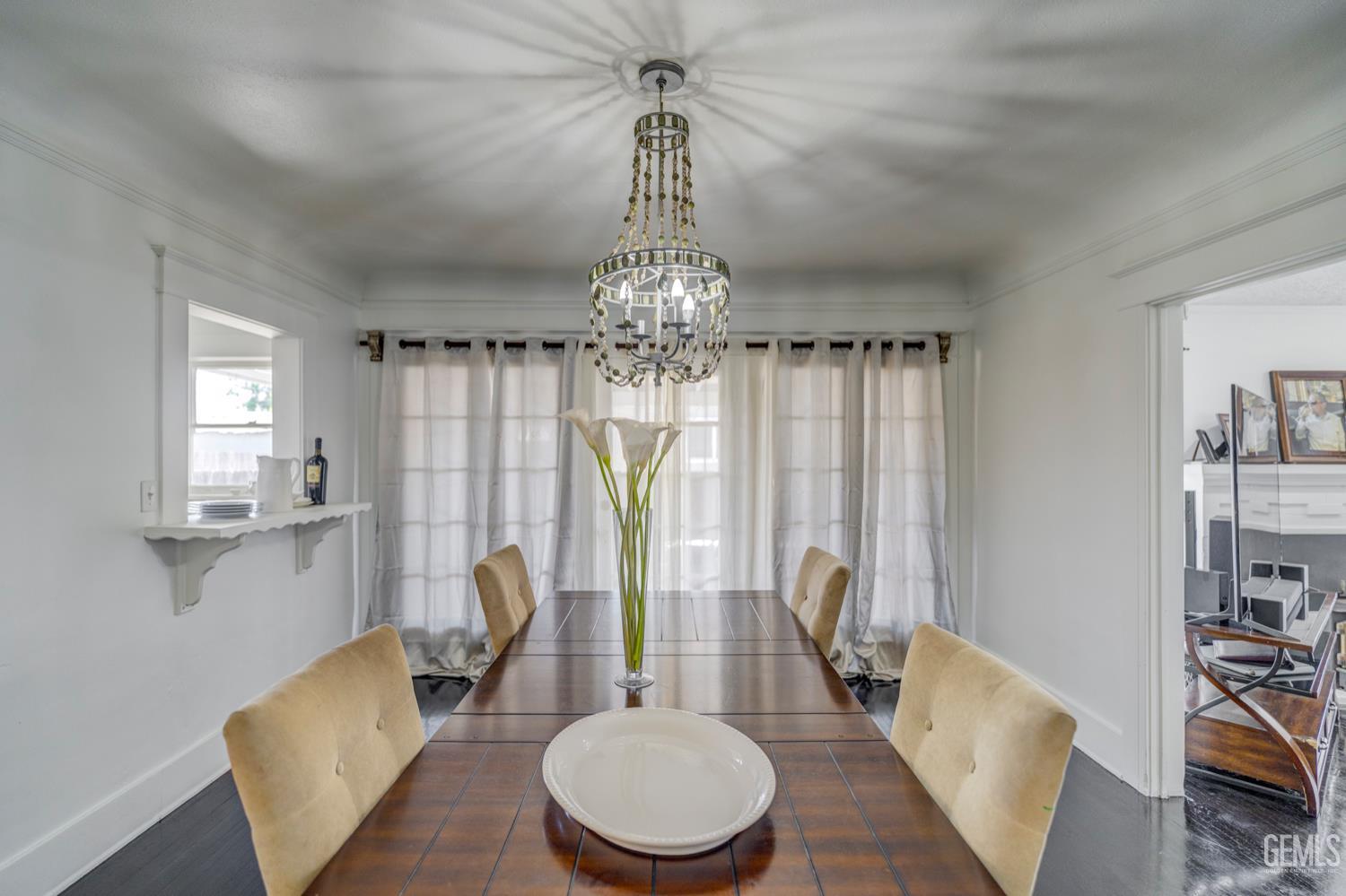 Undisclosed Address Bakersfield, CA 93304 - Photo 11 of 30 a view of a dining room with furniture window and wooden floor
