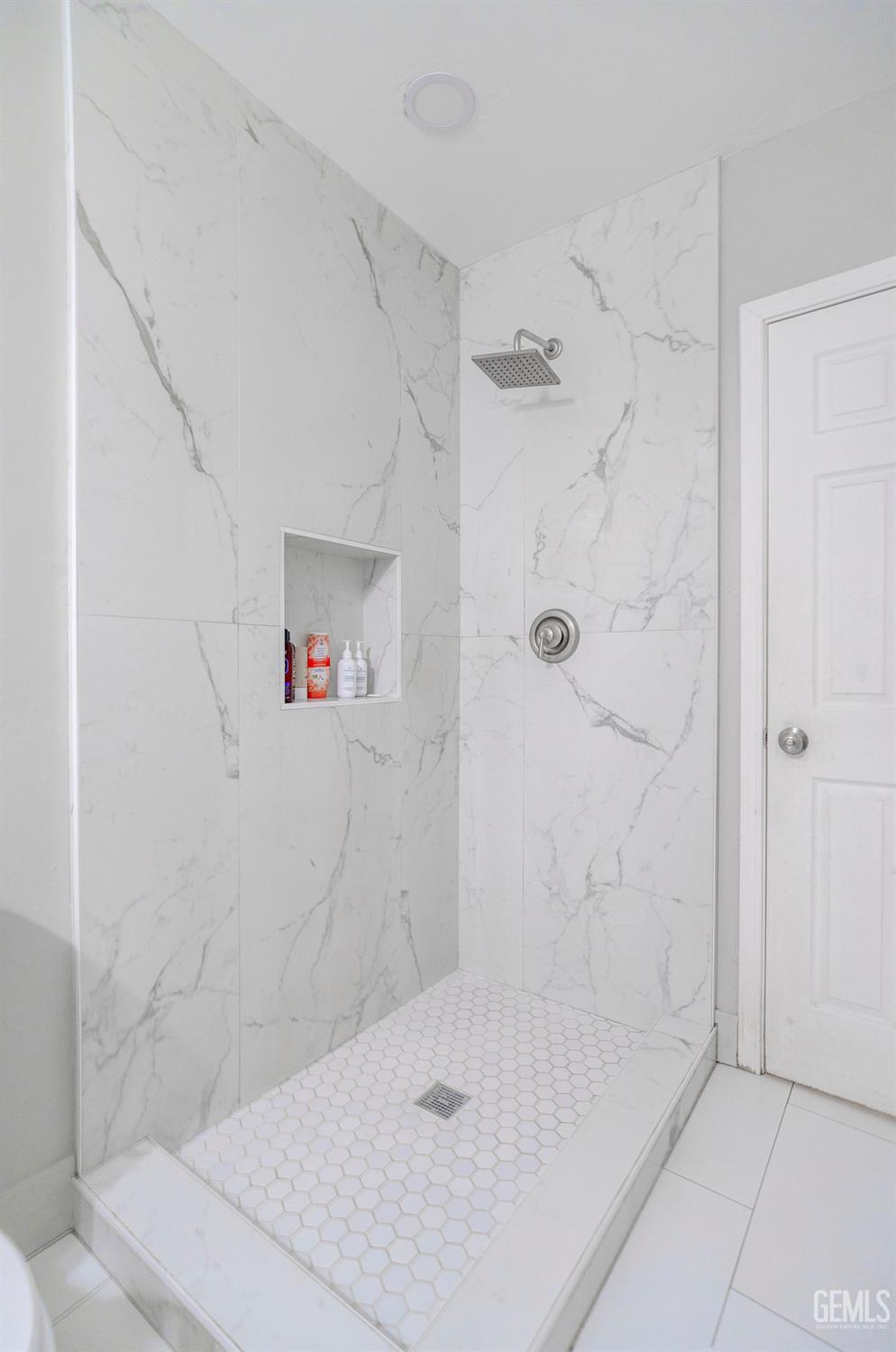 Undisclosed Address Bakersfield, CA 93304 - Photo 22 of 30 a bathroom with a shower