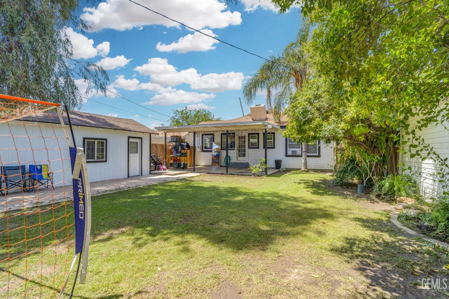 Undisclosed Address Bakersfield, CA 93304 - Photo 30 of 30 a view of a house with a yard