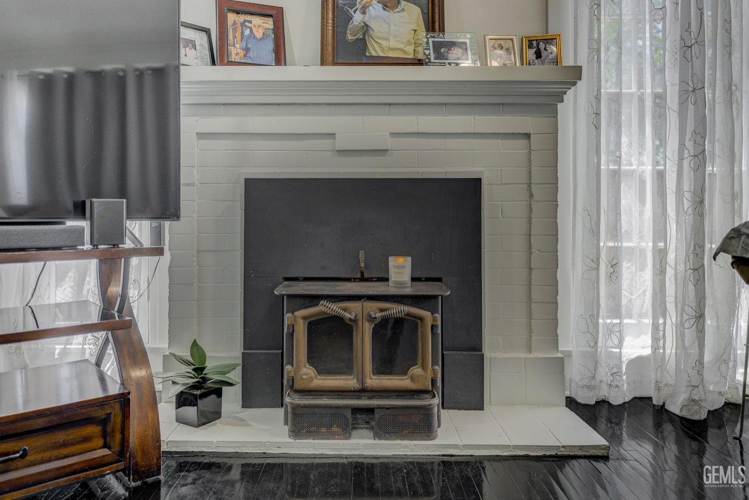 Undisclosed Address Bakersfield, CA 93304 - Photo 6 of 30 a view of living room with furniture and a fireplace