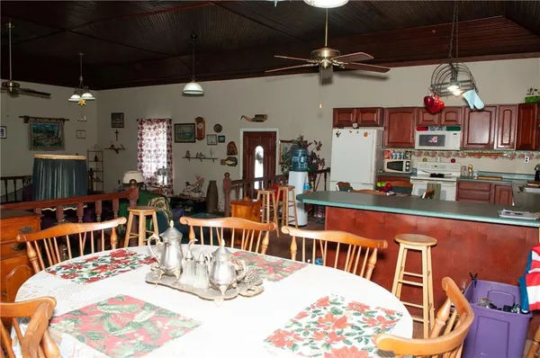 a view of a dining room with furniture
