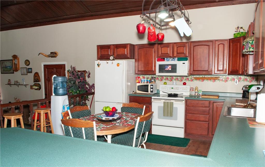 2271 Garards Fort Road Waynesburg, PA 15370 - Photo 14 of 42 a kitchen with a refrigerator and a stove top oven
