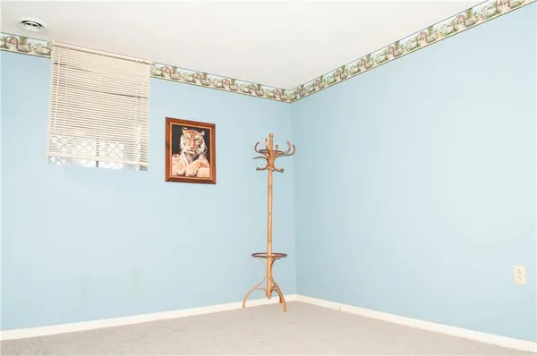 a view of a hallway with a window