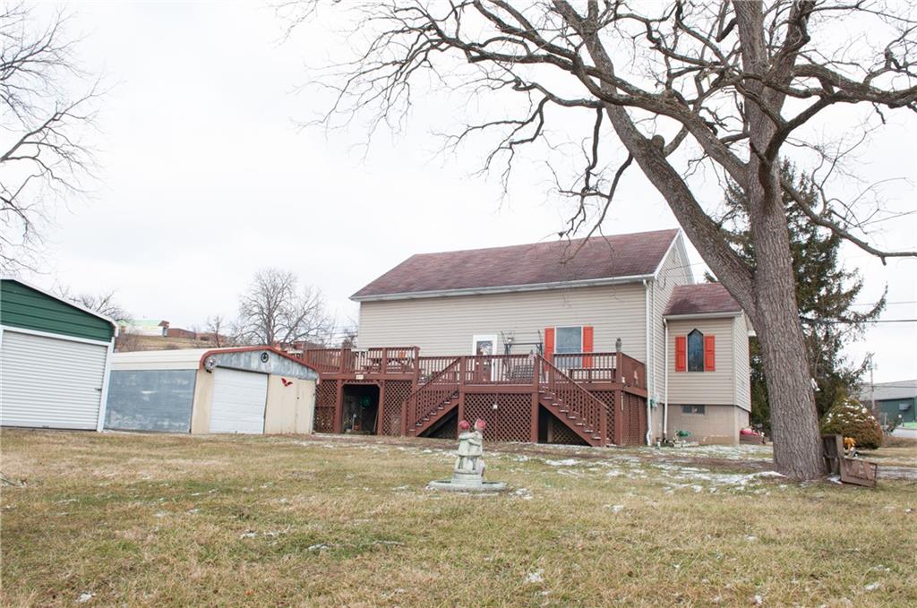 2271 Garards Fort Road Waynesburg, PA 15370 - Photo 2 of 42 a view of a house with a yard covered in snow