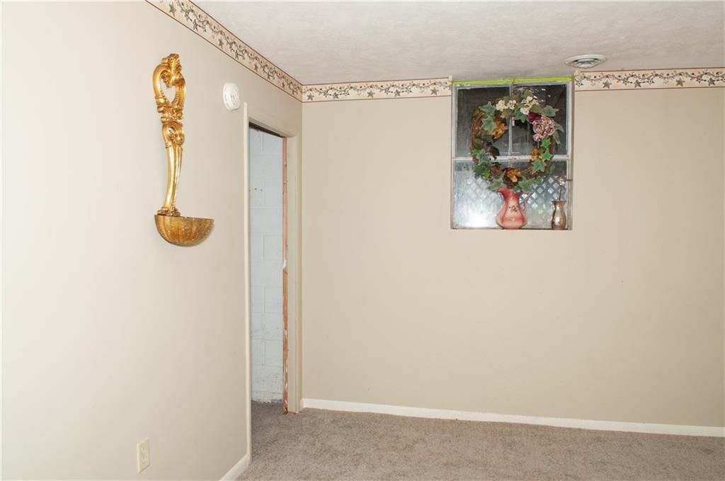 2271 Garards Fort Road Waynesburg, PA 15370 - Photo 24 of 42 a bathroom with a shower and a window