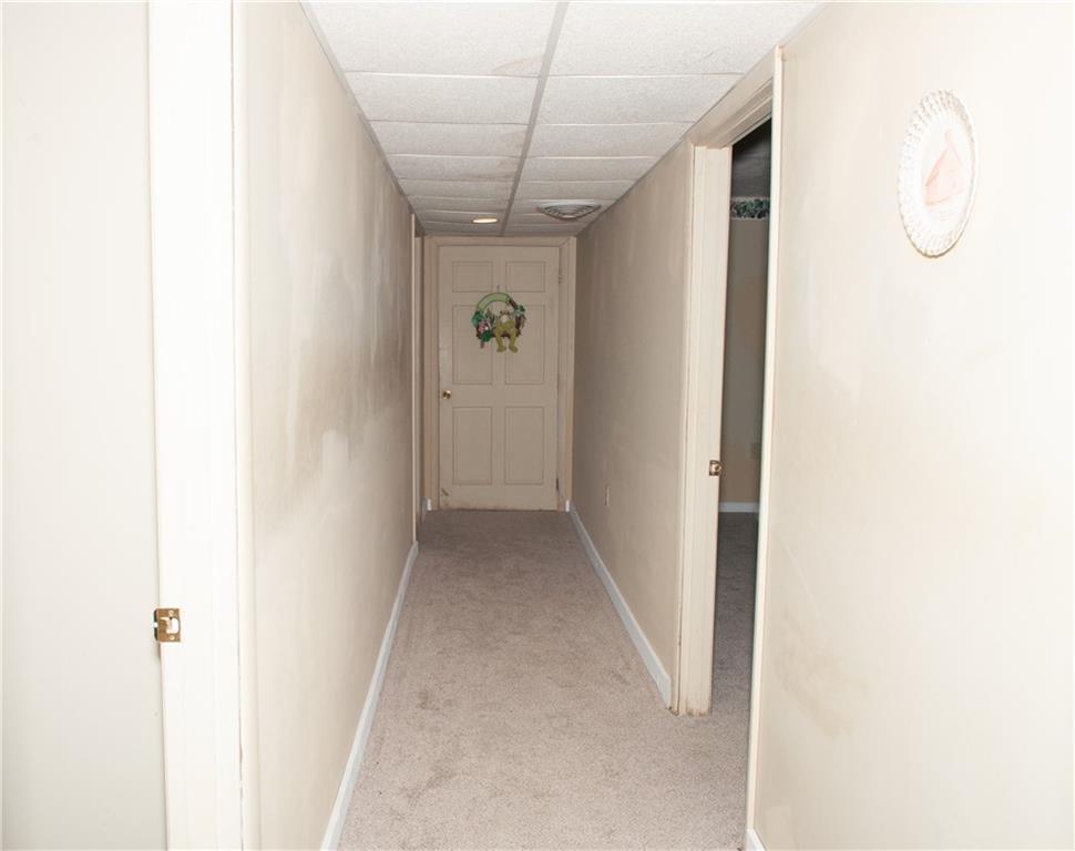2271 Garards Fort Road Waynesburg, PA 15370 - Photo 25 of 42 a view of a hallway with painted walls