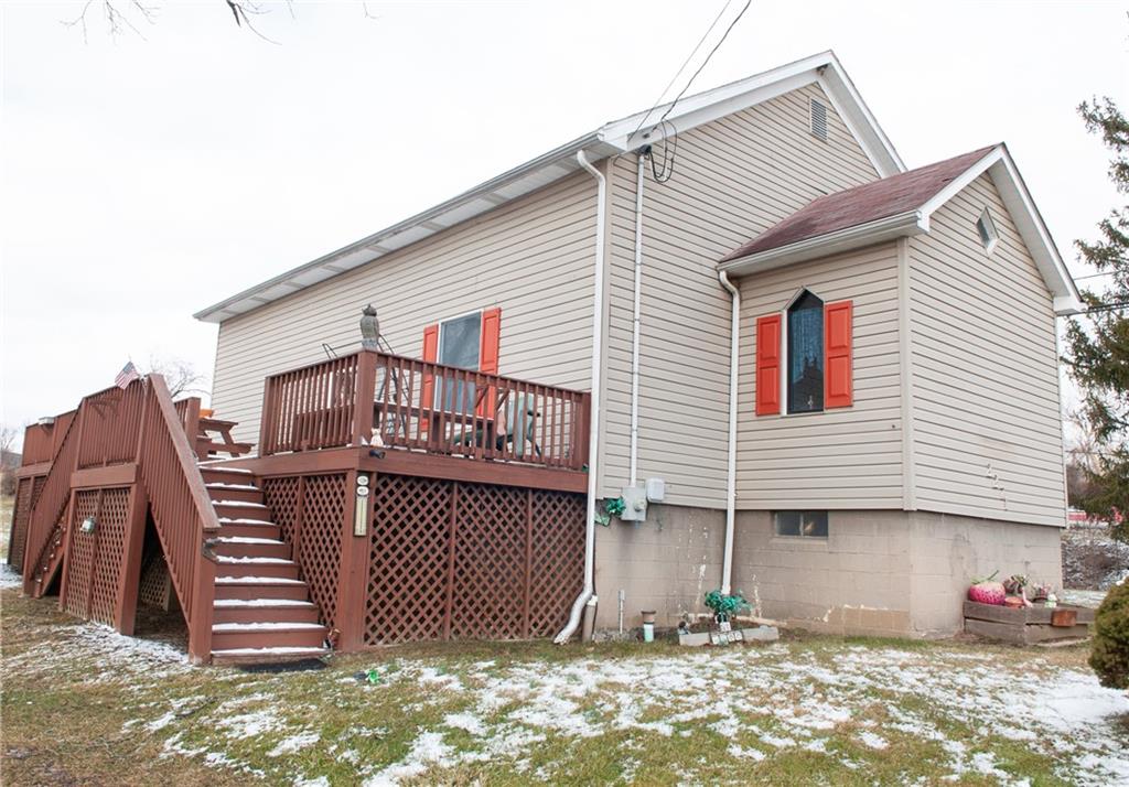 2271 Garards Fort Road Waynesburg, PA 15370 - Photo 3 of 42 a front view of a house with a yard