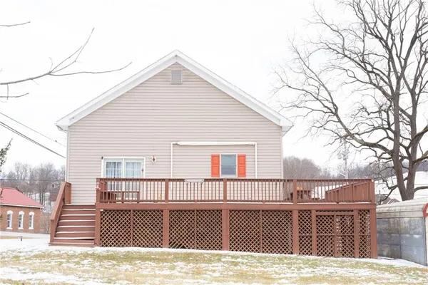a view of a house with a roof deck