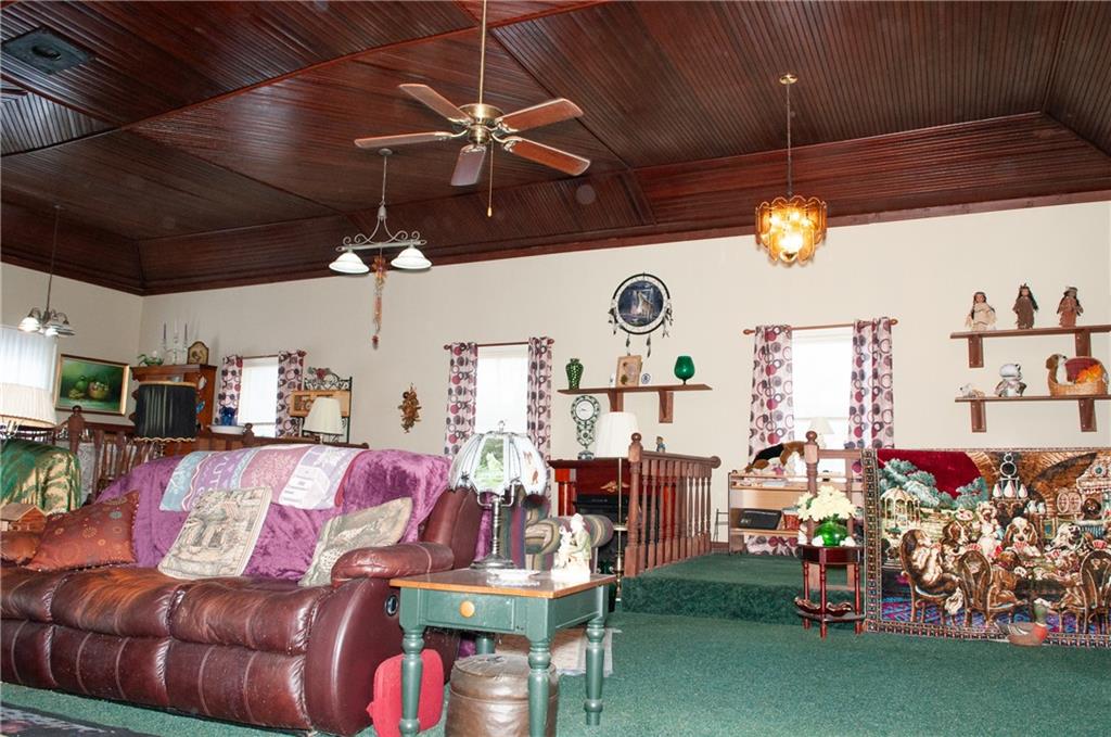2271 Garards Fort Road Waynesburg, PA 15370 - Photo 6 of 42 a living room filled with furniture and a flat screen tv