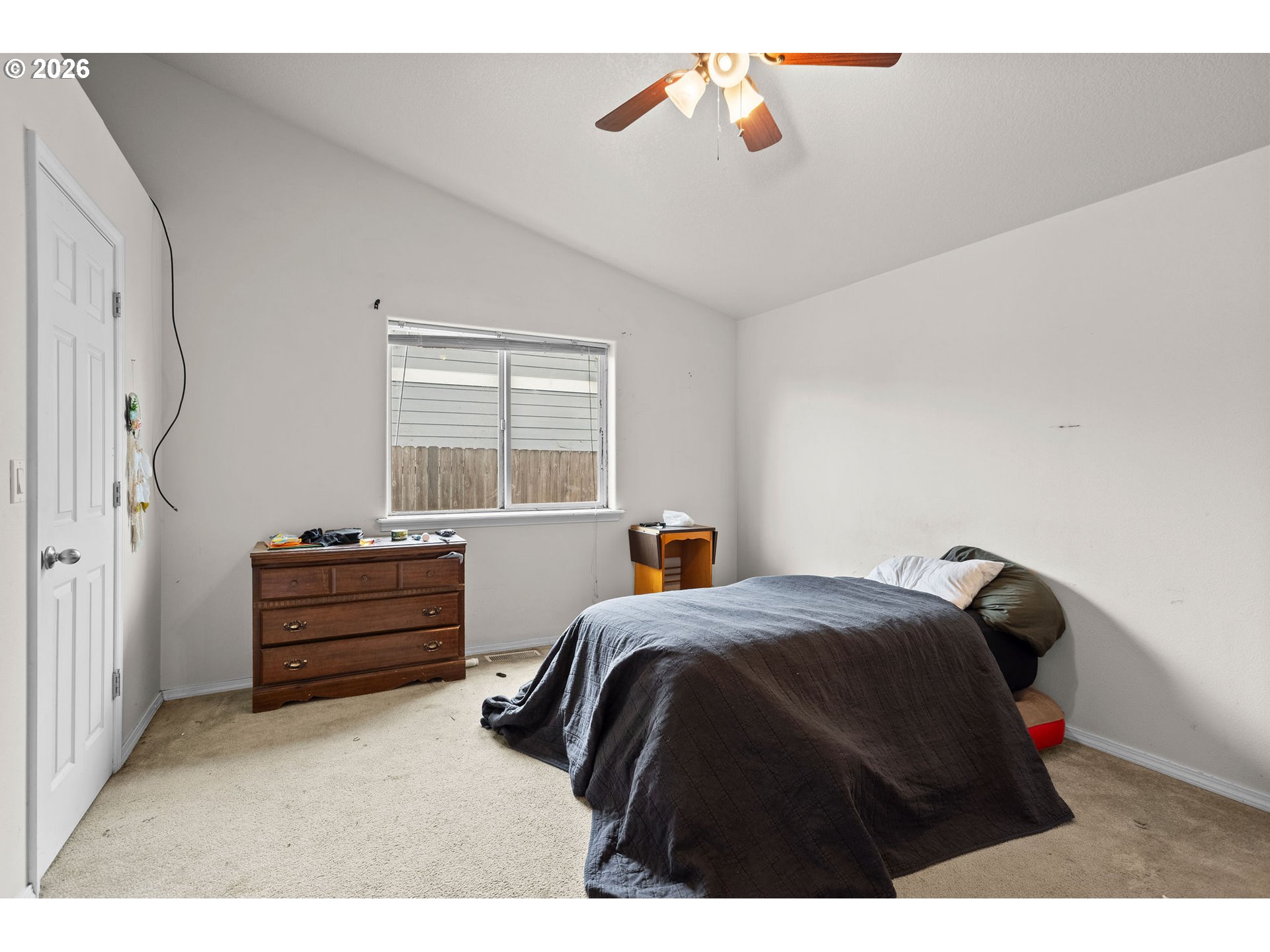 844 Hazel Street Jefferson, OR 97352 - Photo 13 of 22 a bedroom with a bed and a window