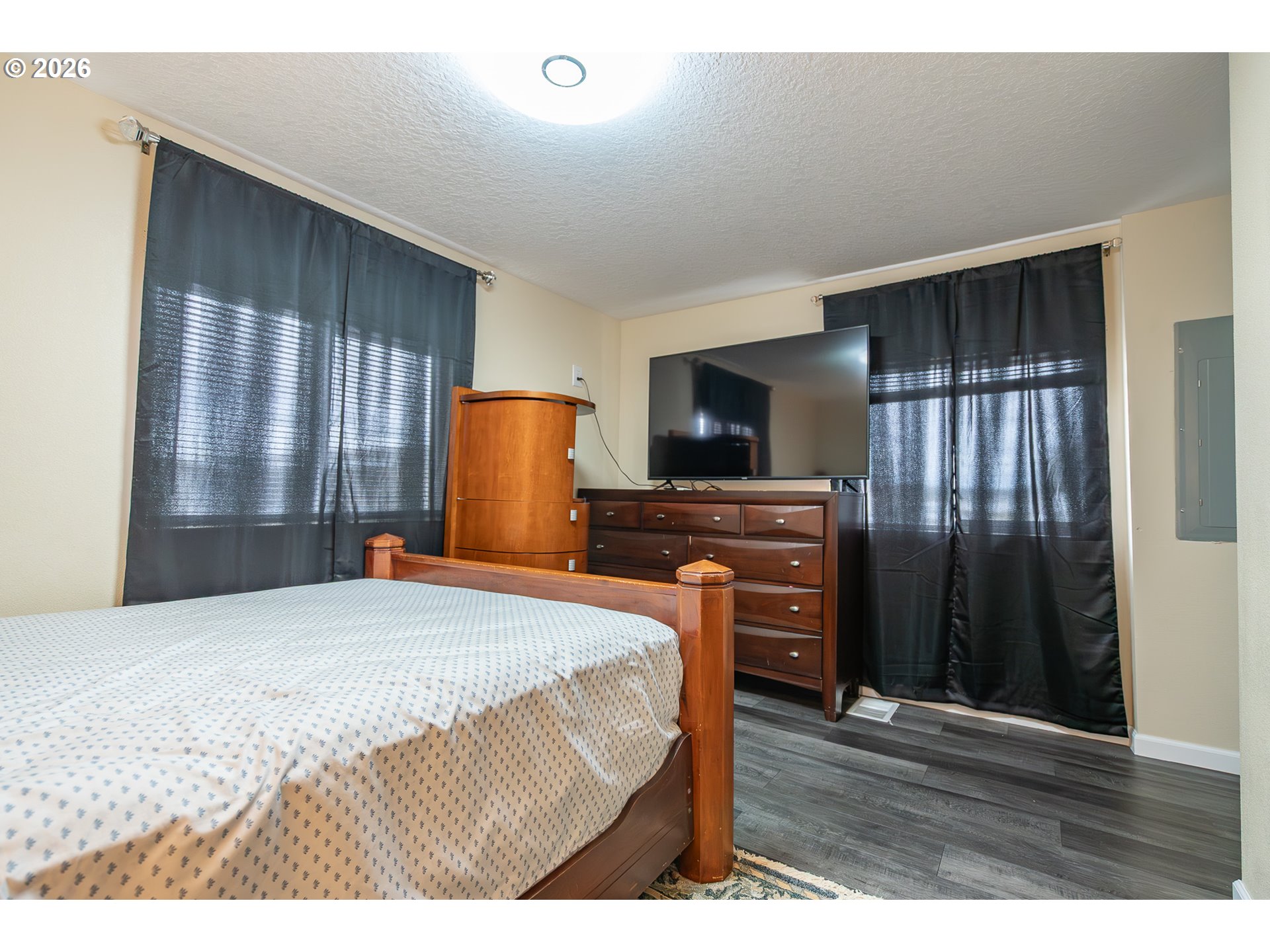 3516 Turner Road Southeast Salem, OR 97302 - Photo 35 of 35 a bedroom with a bed window and a television