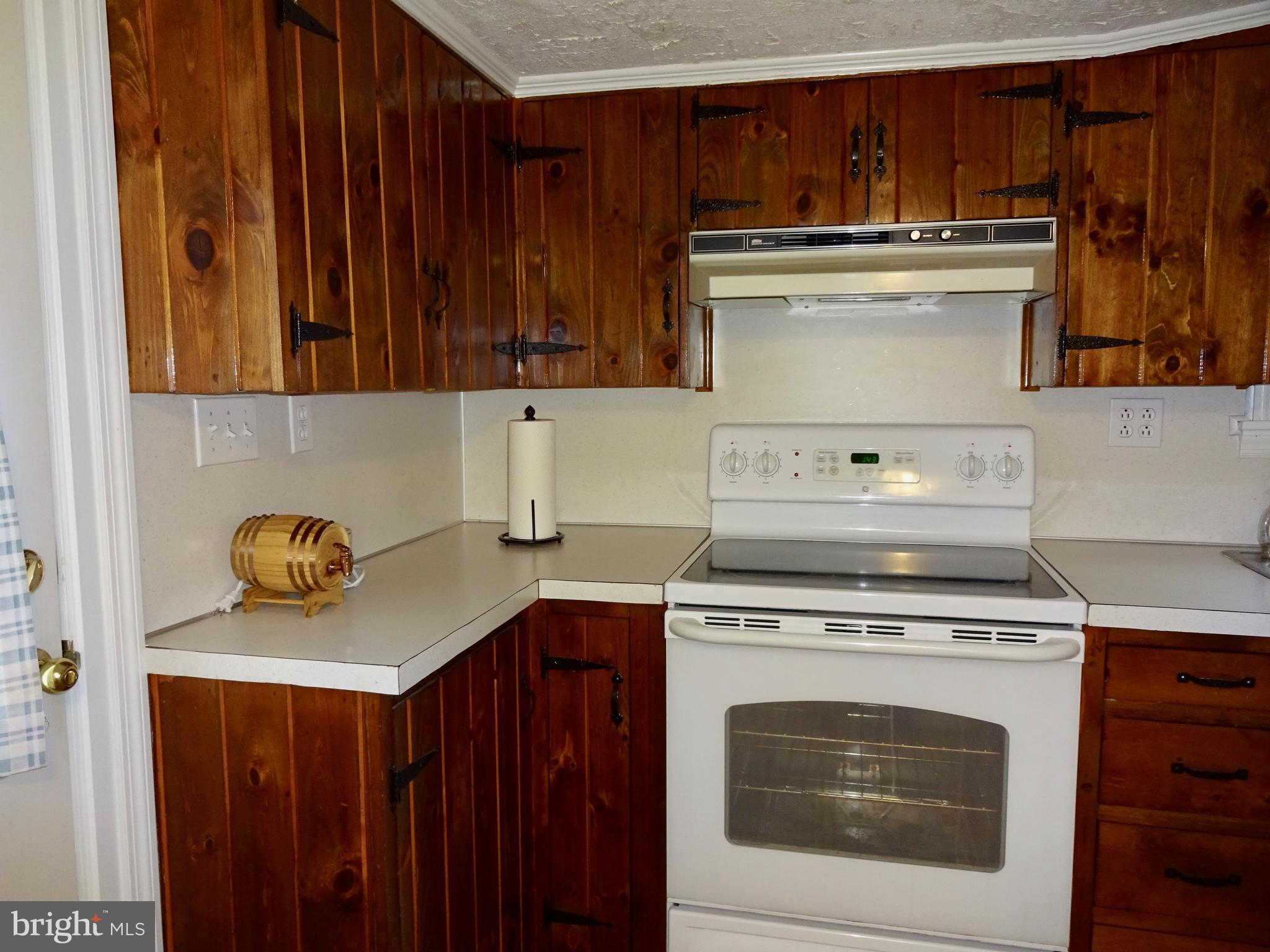 5487 Lehman Road Spring Grove, PA 17362 - Photo 12 of 51 a kitchen with stainless steel appliances granite countertop a stove and a microwave