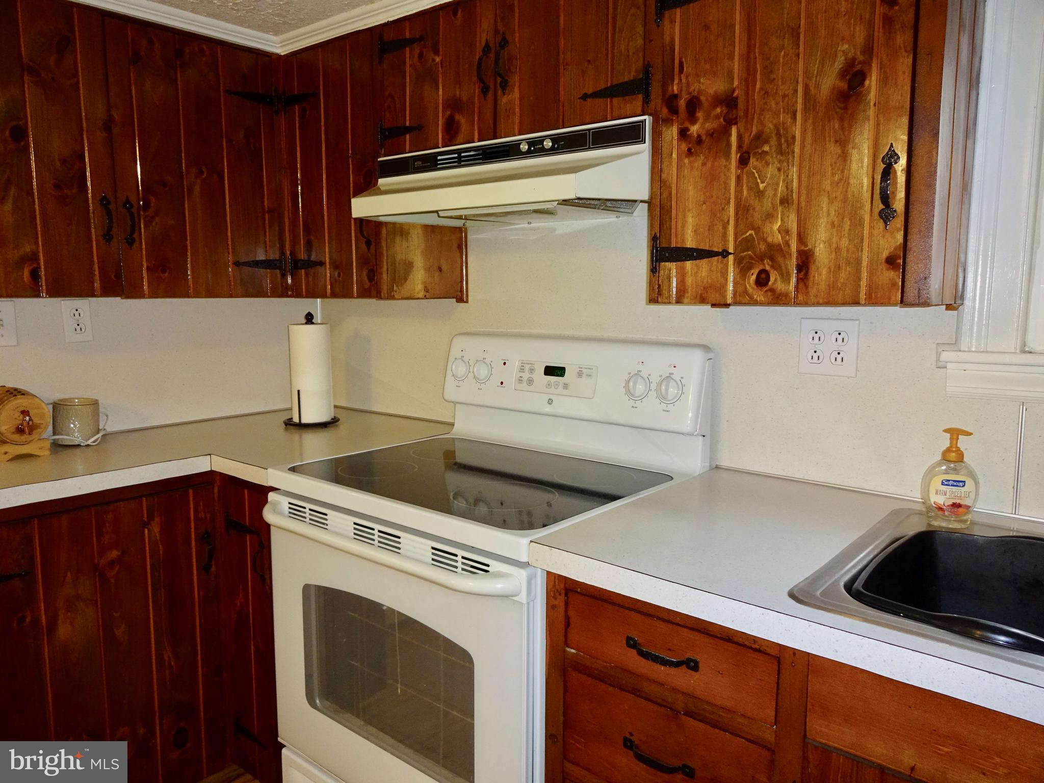 5487 Lehman Road Spring Grove, PA 17362 - Photo 13 of 51 a kitchen with a sink cabinets and appliances