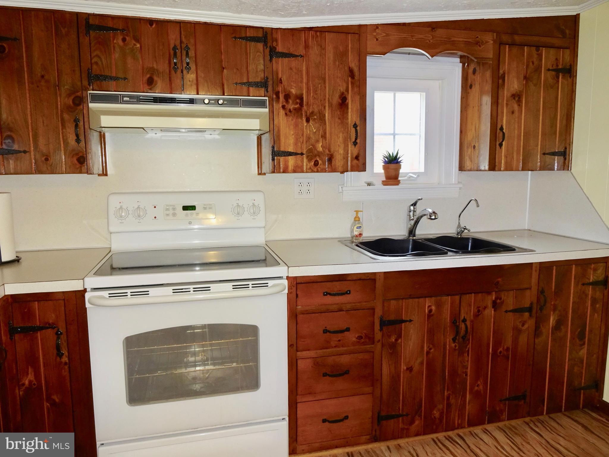 5487 Lehman Road Spring Grove, PA 17362 - Photo 14 of 51 a stove top oven sitting inside of a kitchen