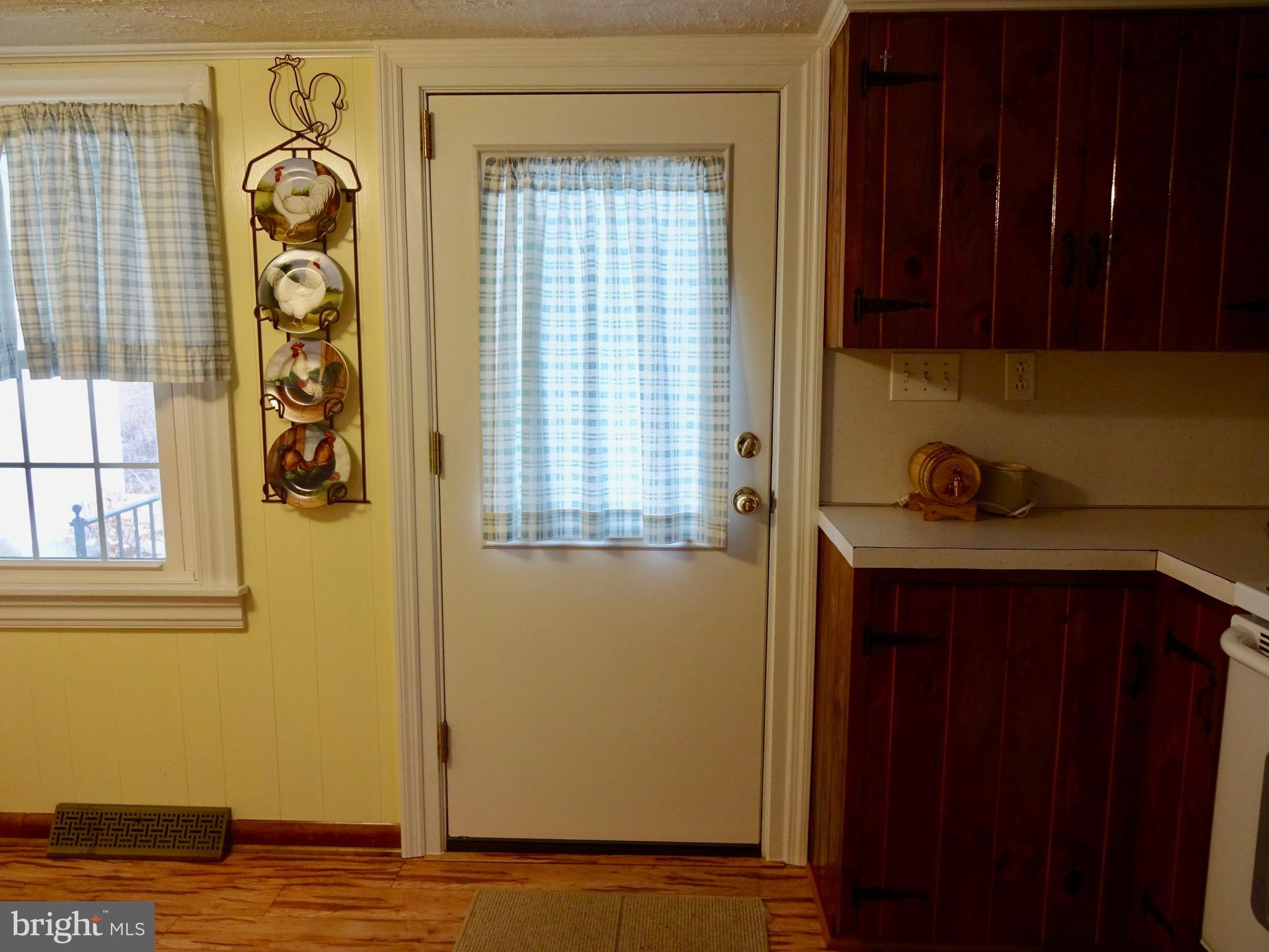 5487 Lehman Road Spring Grove, PA 17362 - Photo 19 of 51 a view of a door and a window in the house