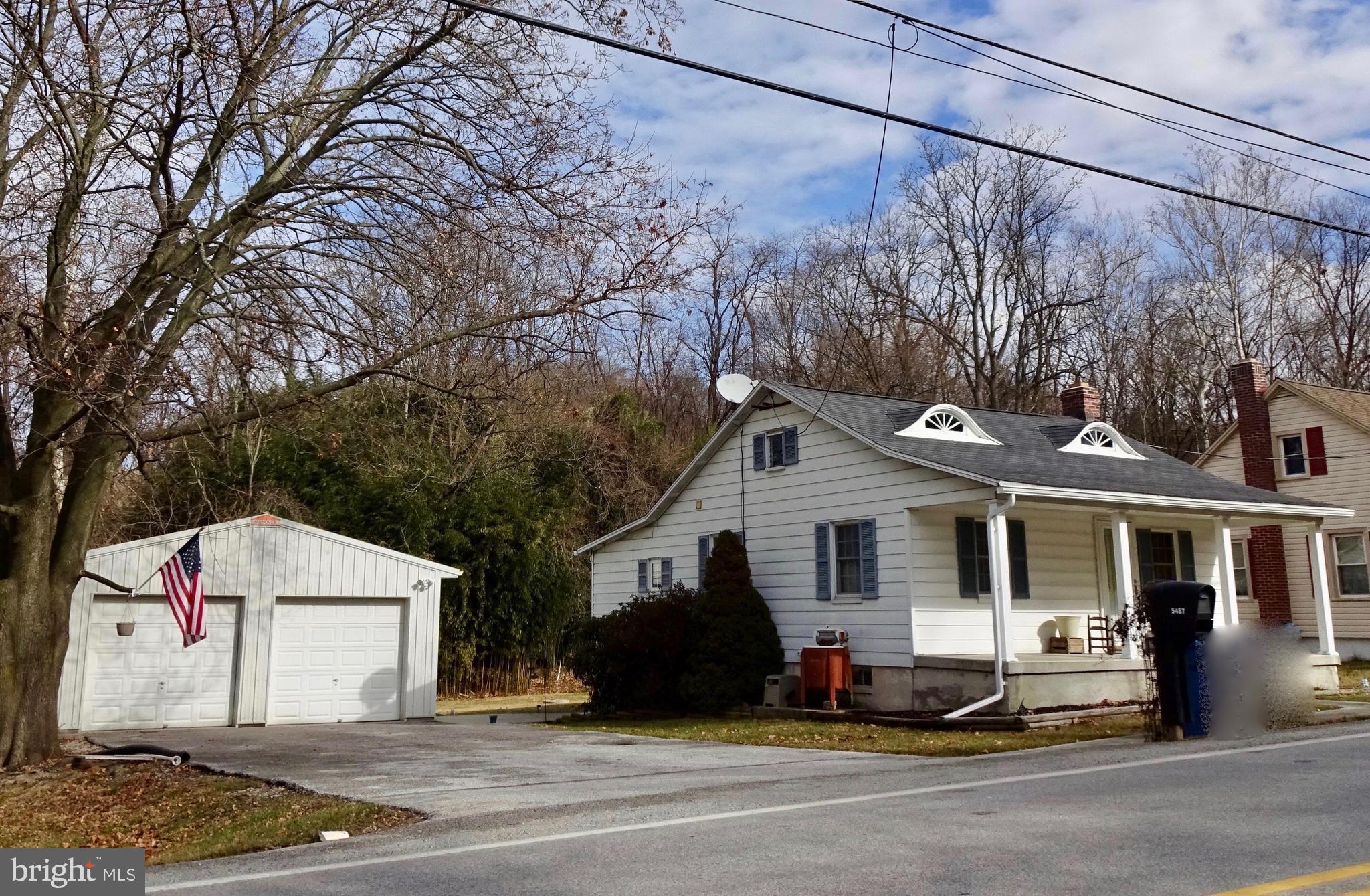 5487 Lehman Road Spring Grove, PA 17362 - Photo 3 of 51 a front view of a house with a yard