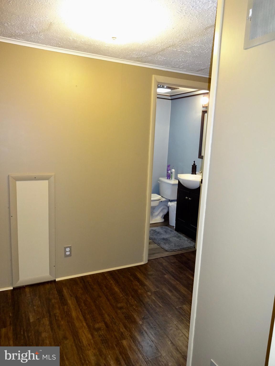 5487 Lehman Road Spring Grove, PA 17362 - Photo 23 of 51 a view of a room with wooden floor and sink