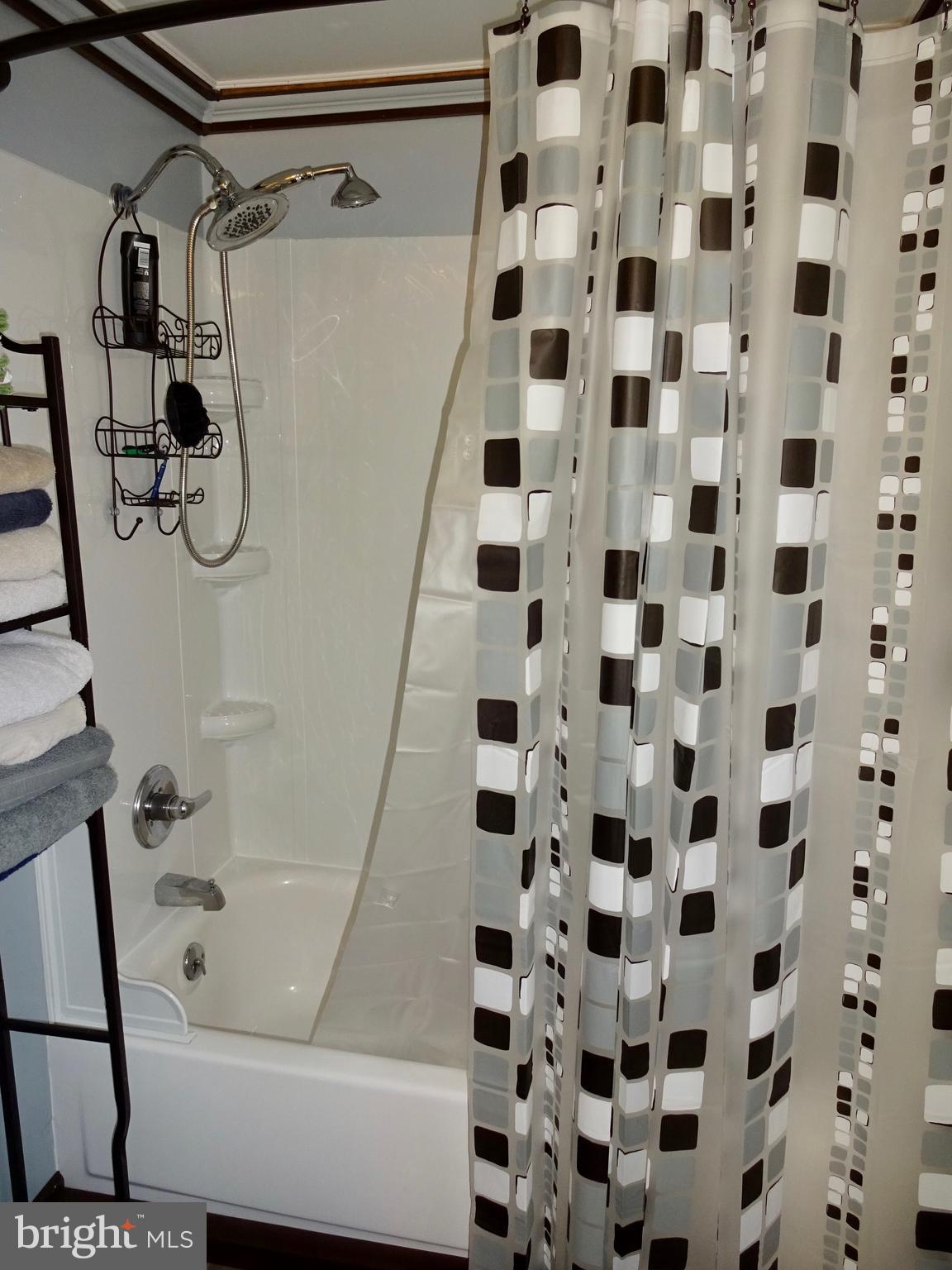 5487 Lehman Road Spring Grove, PA 17362 - Photo 27 of 51 a bathroom with a shower and a bathtub