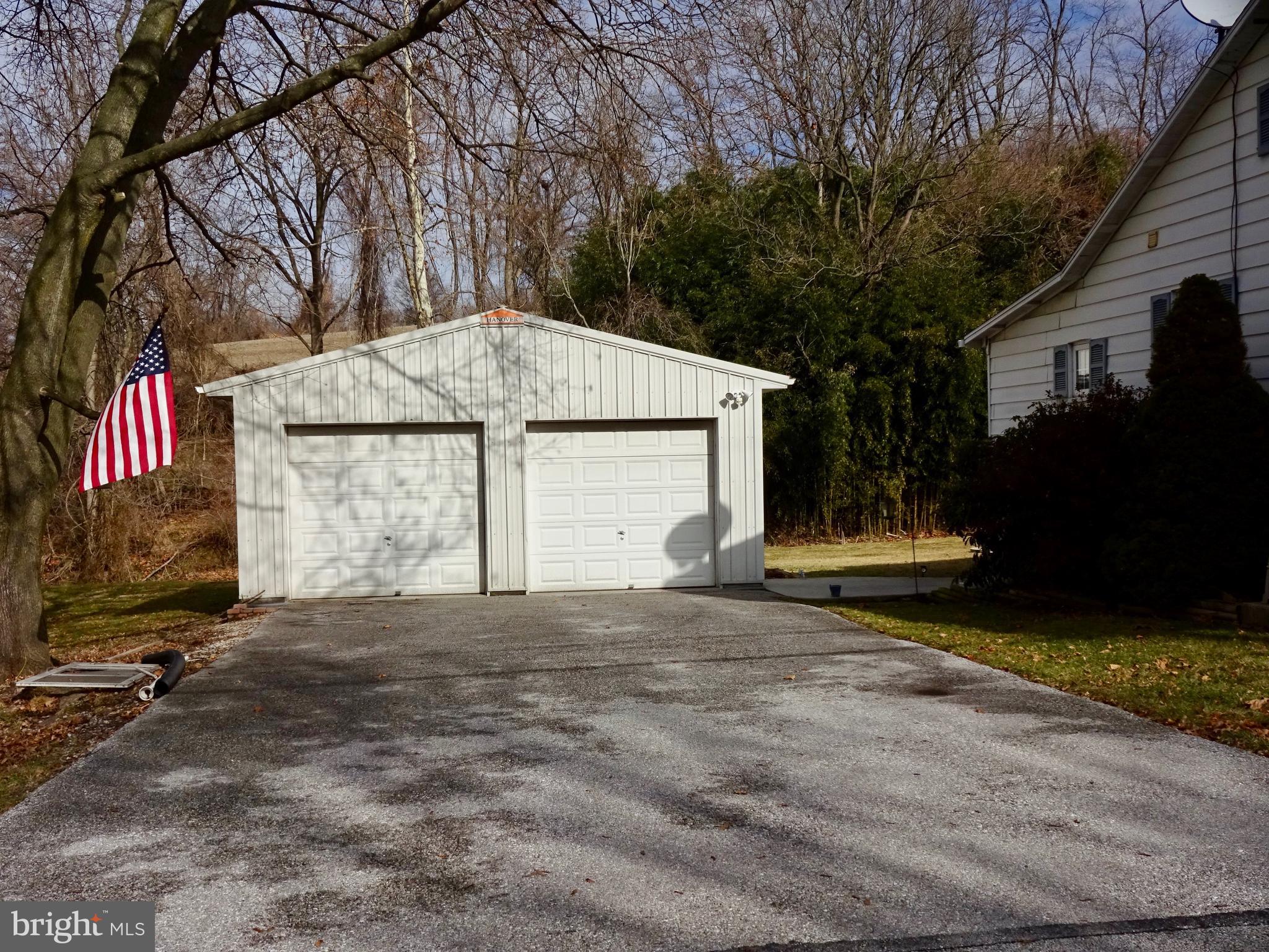 5487 Lehman Road Spring Grove, PA 17362 - Photo 39 of 51 a view of a house with a yard and garage