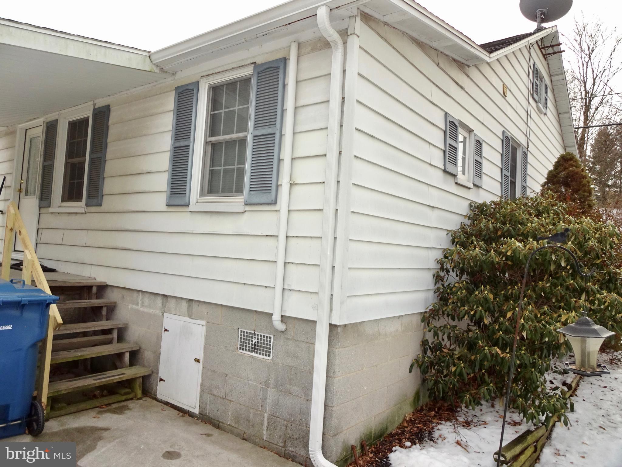 5487 Lehman Road Spring Grove, PA 17362 - Photo 5 of 51 a front view of a house with a garage
