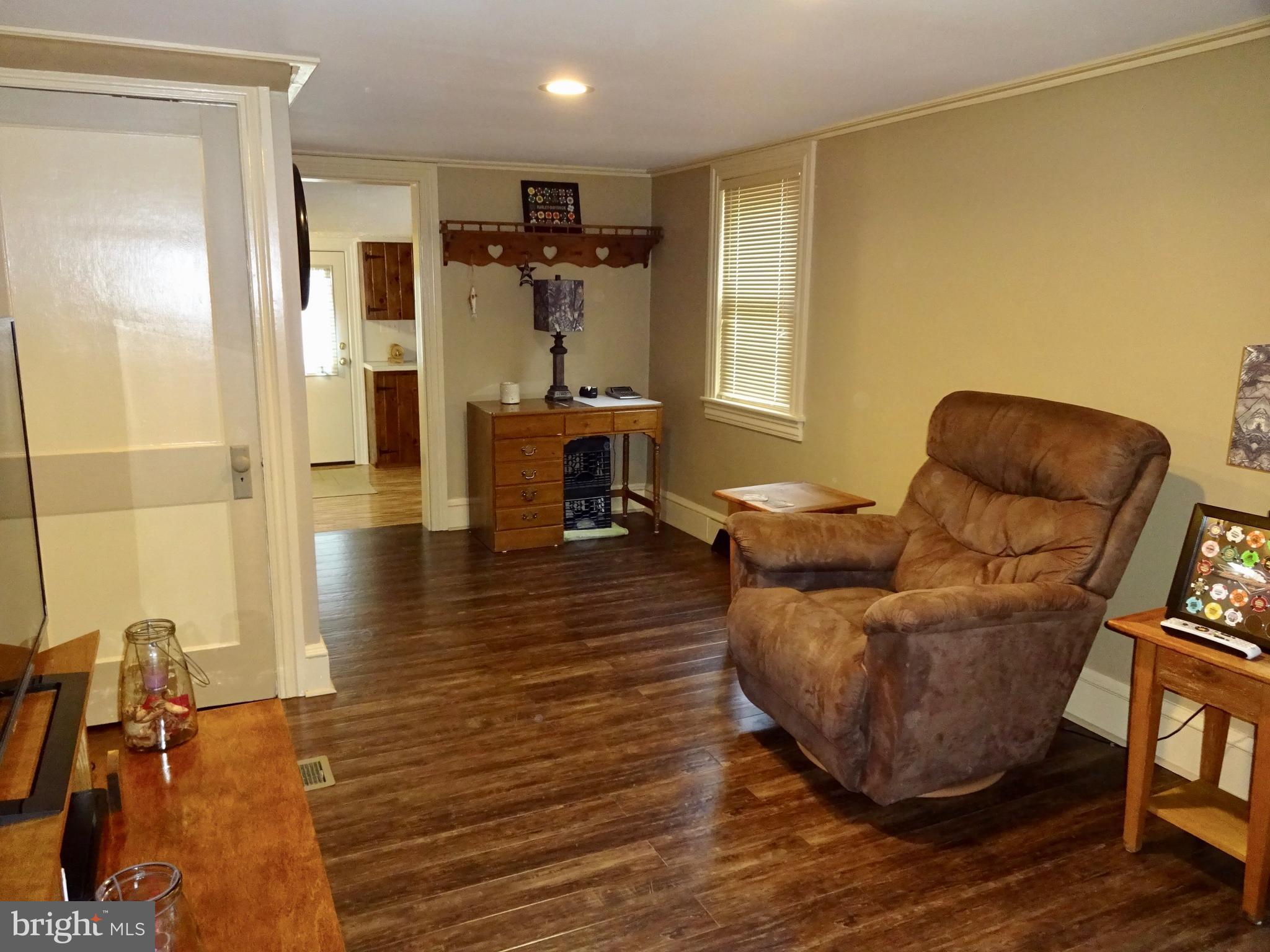 5487 Lehman Road Spring Grove, PA 17362 - Photo 9 of 51 a living room with furniture and a table