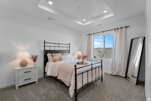1589 South Fins Road, Unit 4178 Washington, UT 84780 - Photo 22 of 30 Recessed lighting highlights the tray ceiling in this room featuring a double window, wall-to-wall carpeting, and bright white walls