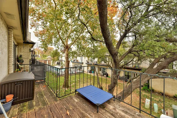a view of a two chairs on the deck