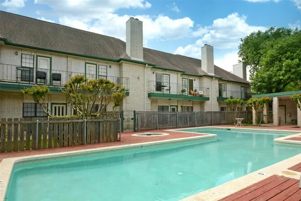a view of a backyard with a garden