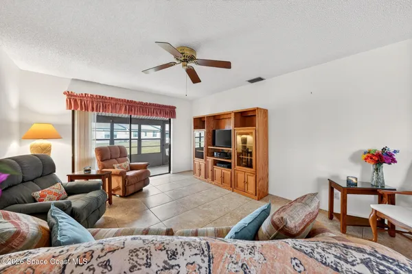 a living room with furniture and window