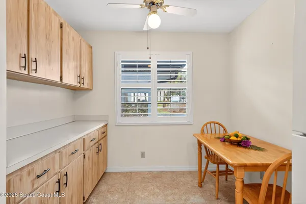 a bathroom with a window a sink and a window