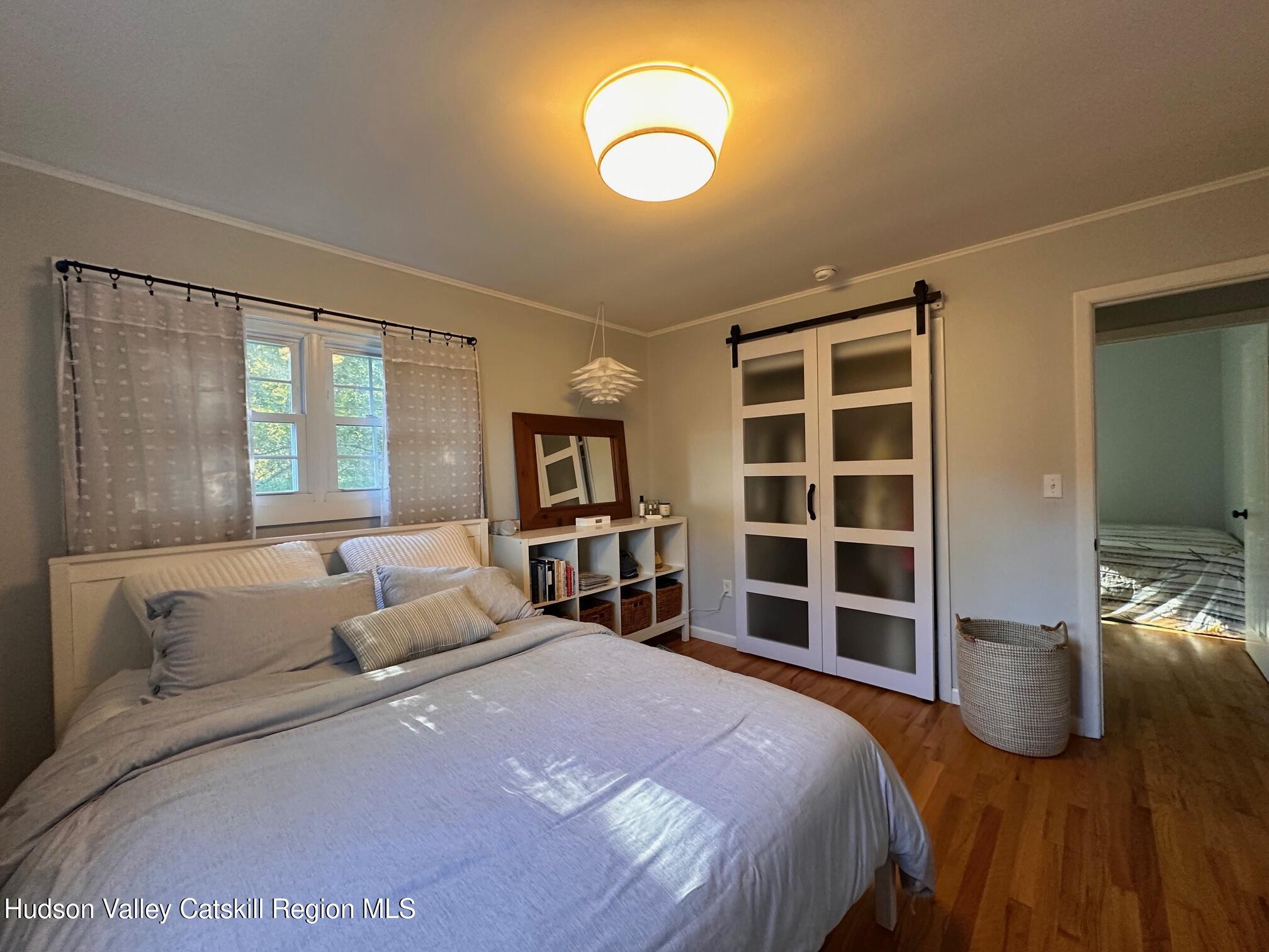 49 George Saile Road Saugerties, NY 12477 - Photo 13 of 23 a spacious bedroom with a bed and closet