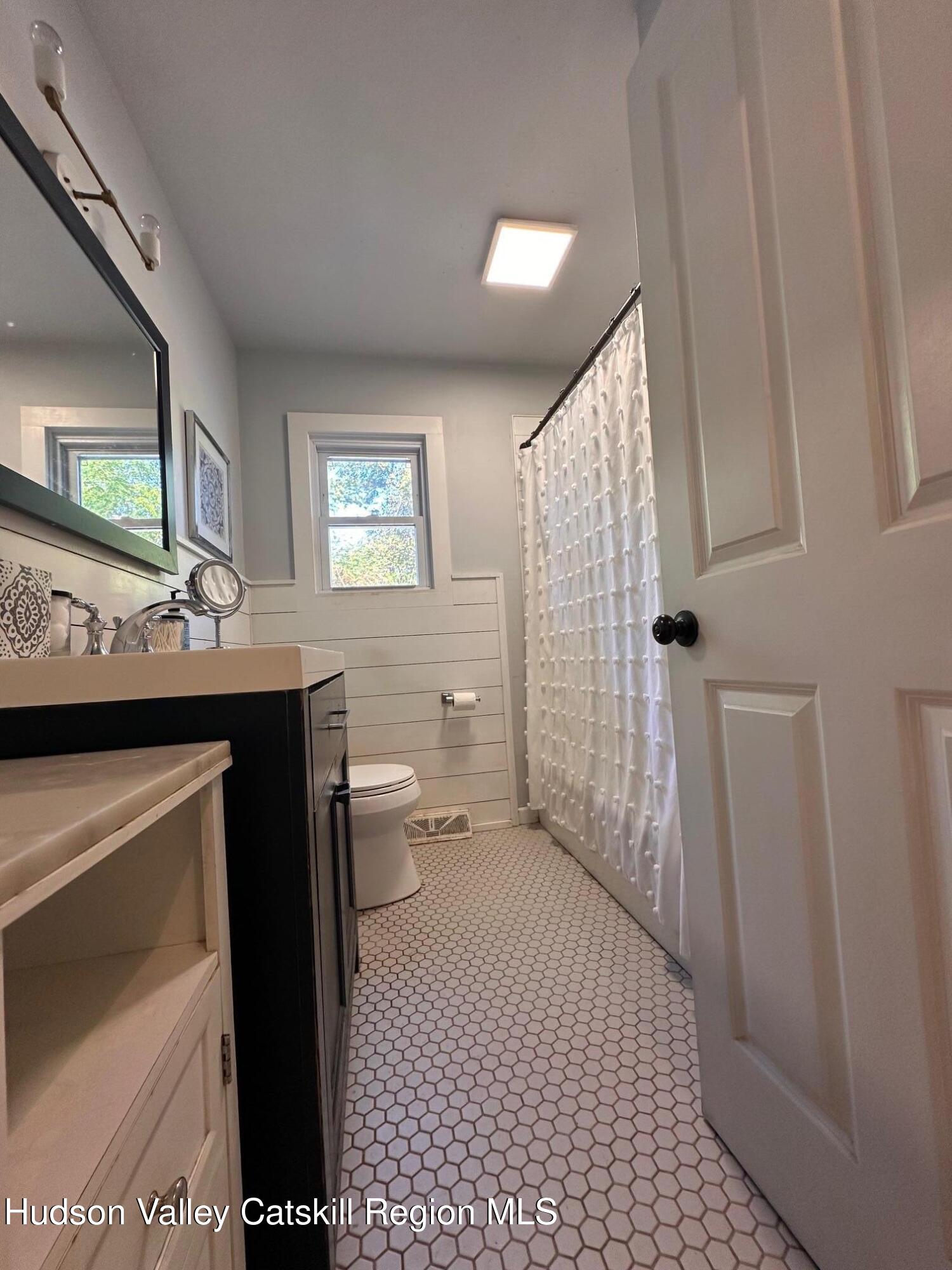 49 George Saile Road Saugerties, NY 12477 - Photo 16 of 23 a bathroom with a sink a toilet and shower