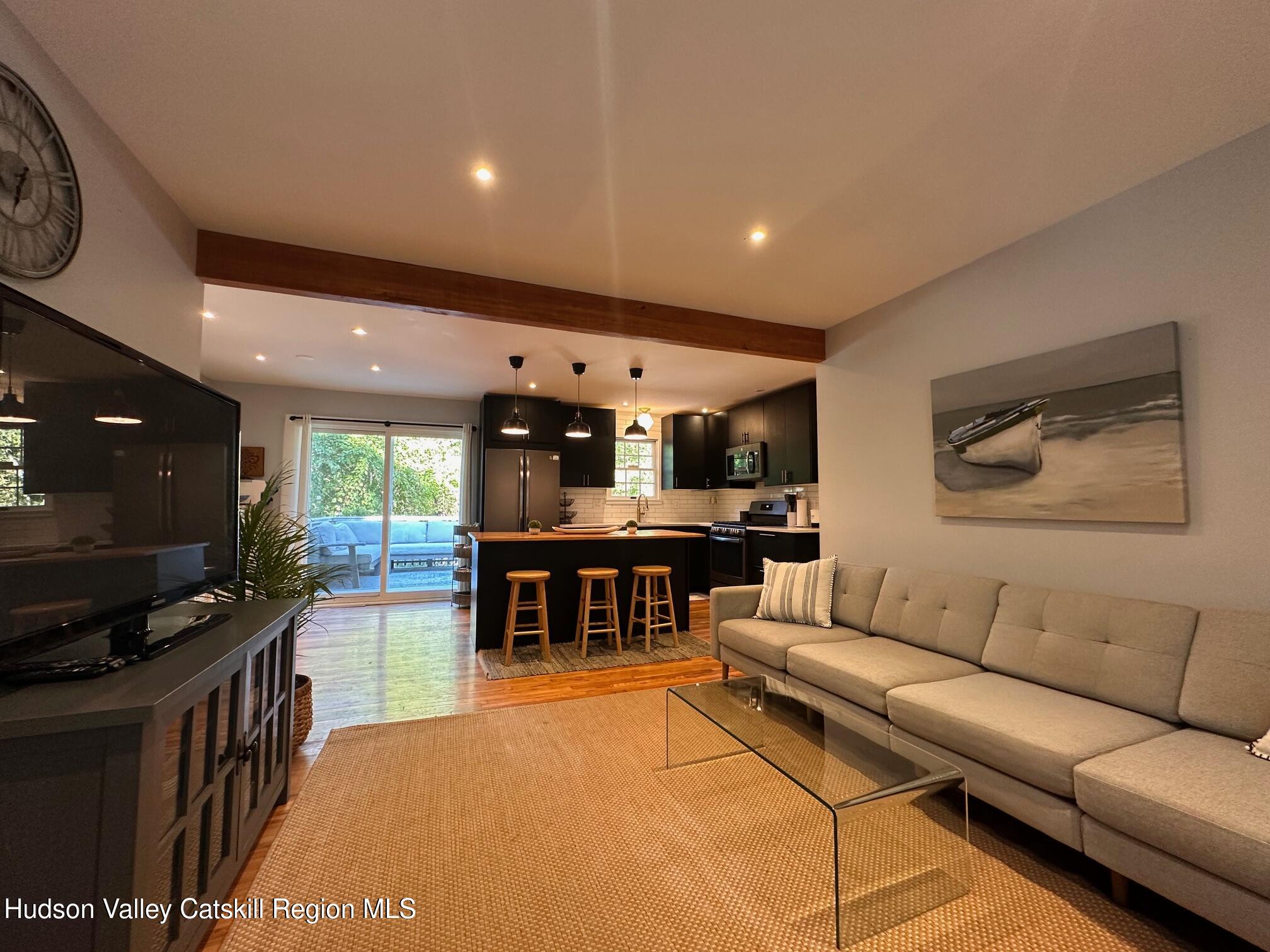 49 George Saile Road Saugerties, NY 12477 - Photo 5 of 23 a living room with furniture and a flat screen tv