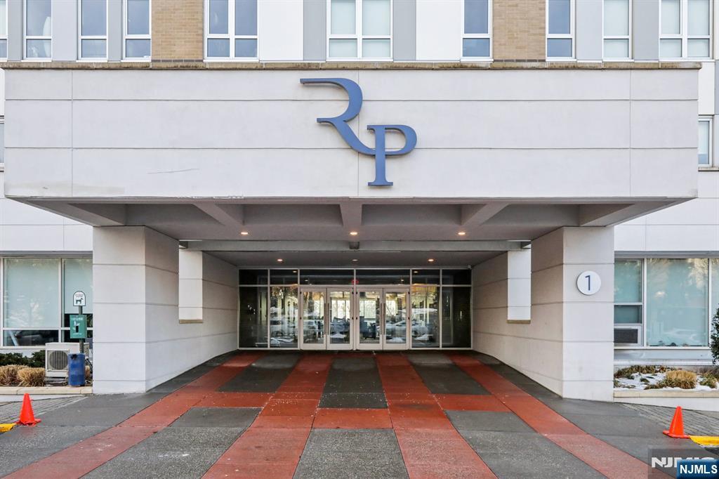 1 Executive Drive, Unit 201 Fort Lee, NJ 07024 - Photo 2 of 7 a view of an entryway with a window