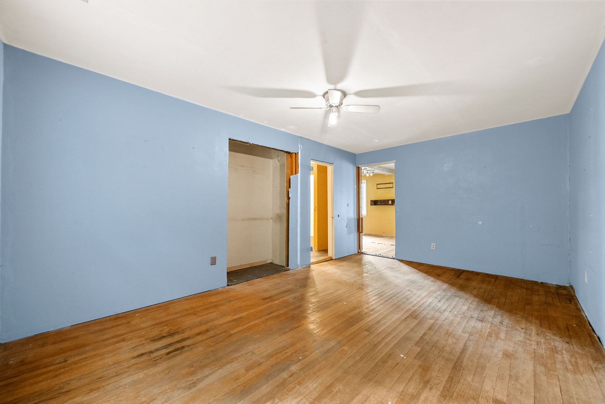 234 Lower Standing Rock Road Dover, TN 37058 - Photo 22 of 41 a view of empty room with wooden floor and fan