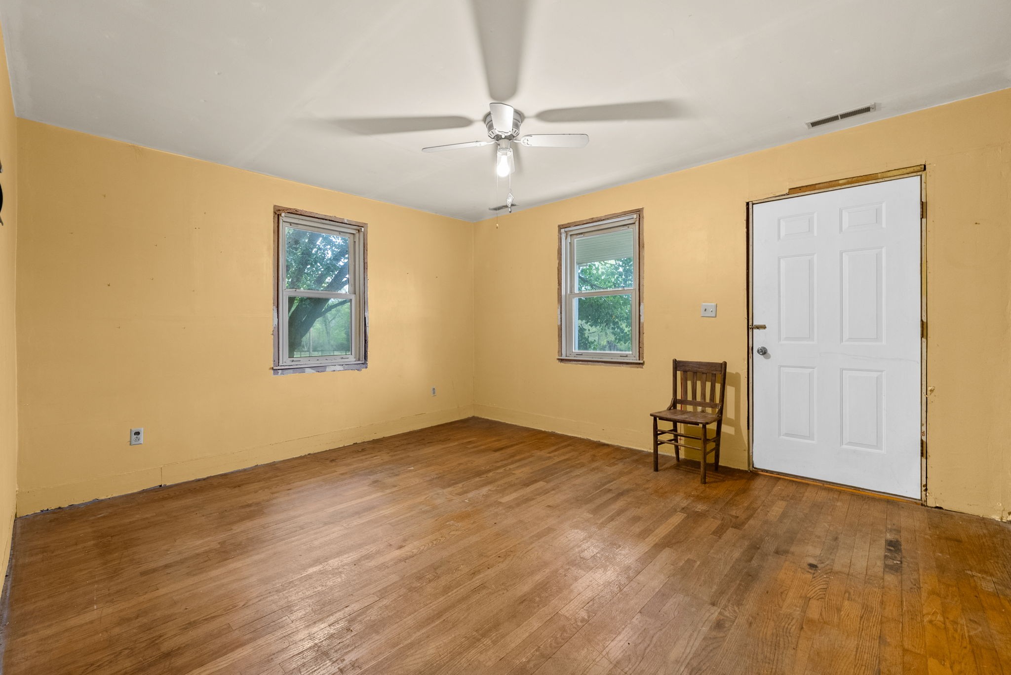 234 Lower Standing Rock Road Dover, TN 37058 - Photo 23 of 41 a view of an empty room with window and wooden floor