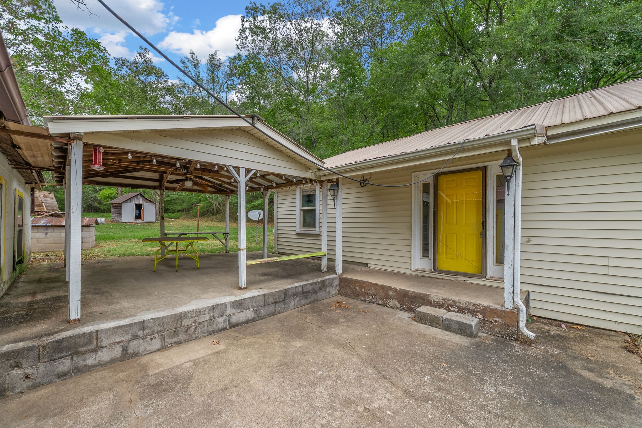 234 Lower Standing Rock Road Dover, TN 37058 - Photo 27 of 41 a view of a house with a backyard